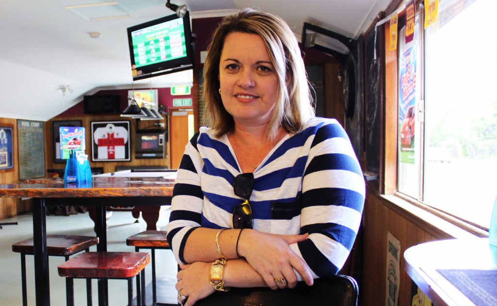 Anakie Hotel owner Robyn George stands in front of Frank Murray’s empty chair. Anakie Hotel owner Robyn George stands in front of Frank Murray’s empty chair.